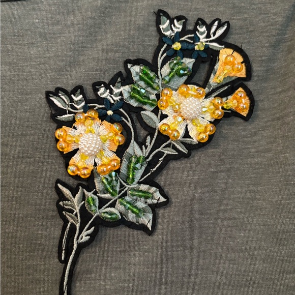 Dainty Fem Ruffle Top
NWT - Picture 6 of 7